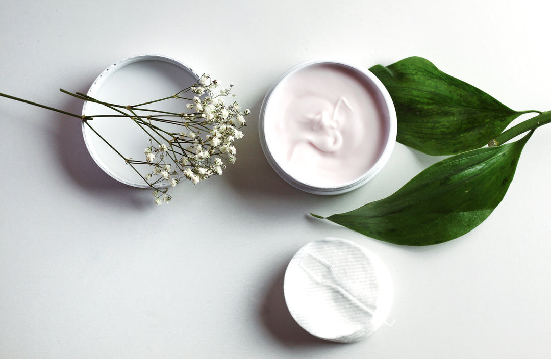 skincare products and greenery